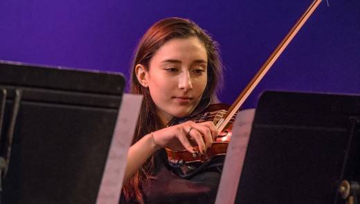 student playing violin