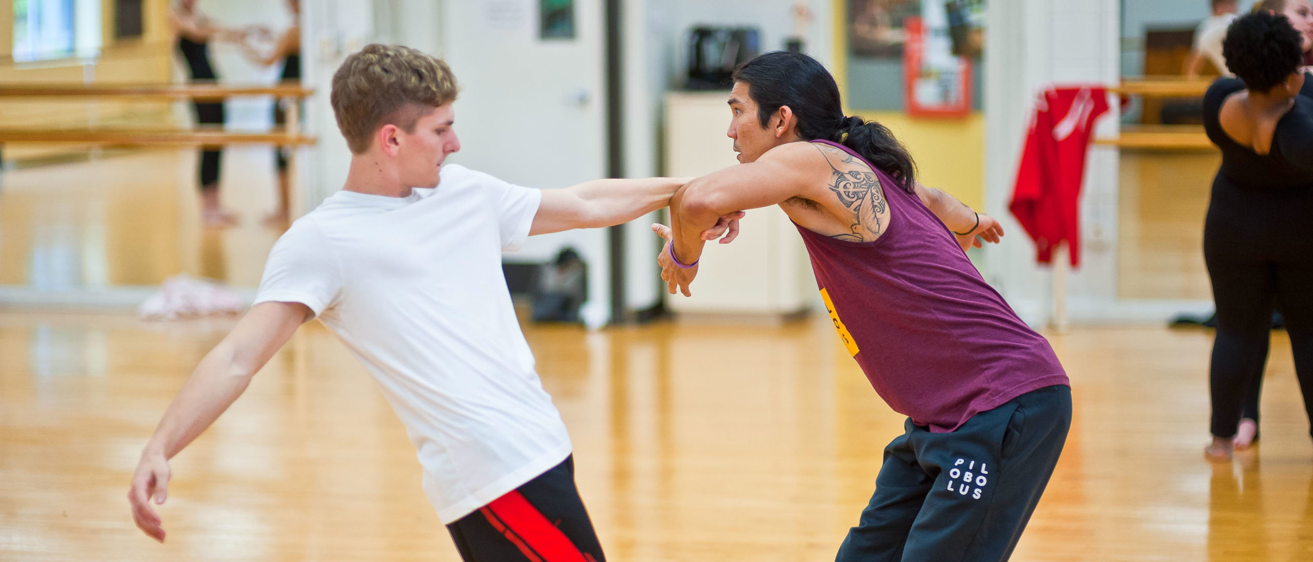 Teacher dancing with a student in class