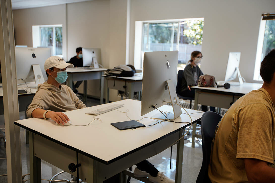 high school students using mac computers