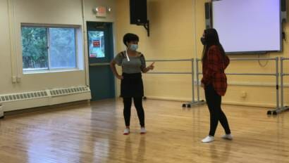 girls talking in dance studio