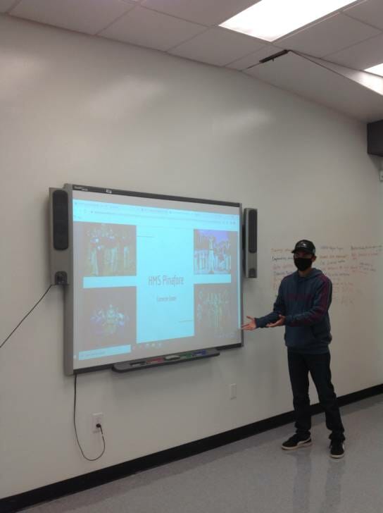 student giving presentation