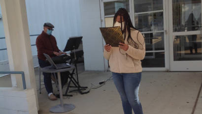 Performing Arts student singing in class outside