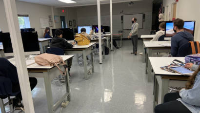 Visual Arts students in class at desks