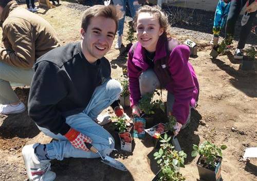 Two Students Planting