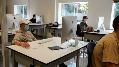 high school students using mac computers
